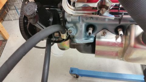 1970 Pontiac Trans Am - Close-up view of an engine component with visible hoses and spark plugs, bearing a SuperMotors watermark.