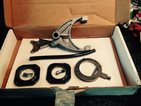 1995 Ford Bronco - A box containing various metal and rubber components for a transfer case assembly.