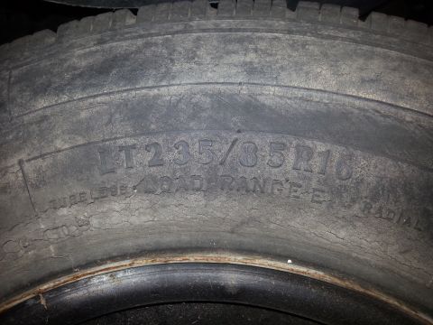 1989 Ford Ranger - A close-up view of a tire's sidewall shows its size and load rating.