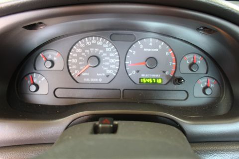 2002 Ford Mustang - The odometer reads 154,571 miles on this vehicle's dashboard.