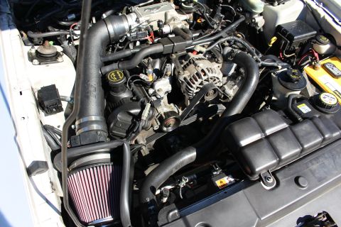 2002 Ford Mustang - Engine bay of a 2002 Ford Mustang, an upgraded K&N air intake system.