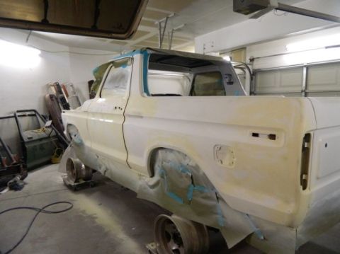 1979 Ford Bronco - Ford Bronco body in primer, likely undergoing restoration or repair work.