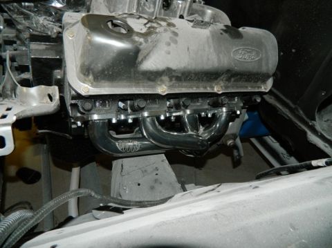 1979 Ford Bronco - Close-up of a Ford V8 engine block chrome headers and "Vortec" branding.