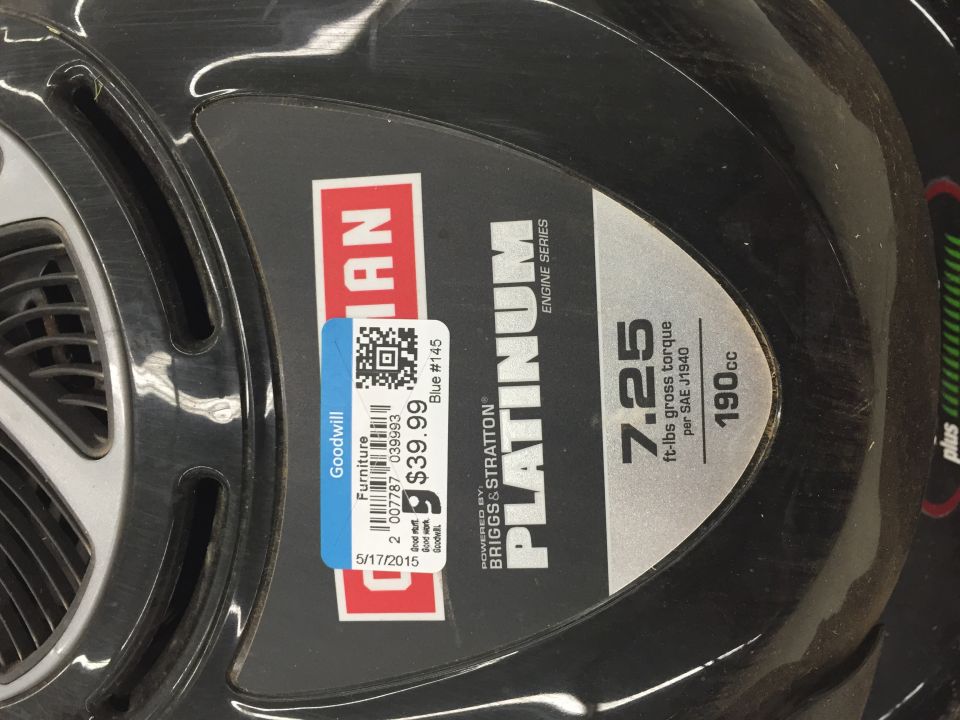 Close-up of a Craftsman Platinum engine cover with Briggs & Stratton branding, showing 7.25 ft-lbs gross torque and 190cc