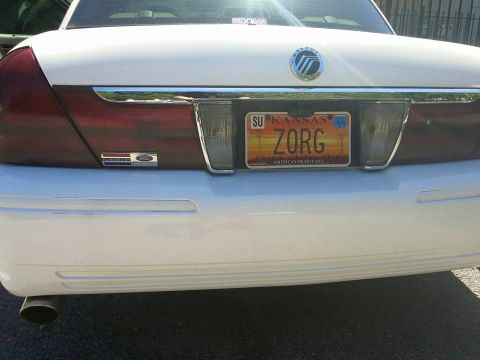 2000 Mercury Grand Marquis - Rear view of a white Mercury Grand Marquis with a Kansas license plate.