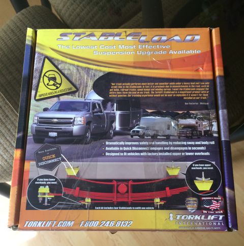 1997 Dodge 3500 - This is a box for a TorkLift StableLoad suspension upgrade kit, a truck and trailer graphic.