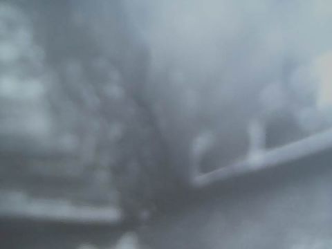 1994 Ford Bronco - A blurry view of an exhaust pipe, with Supermotors.net logo visible.