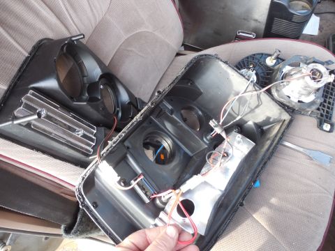 1983 Ford Bronco - The wedge connector spliced to 2 sets of wires supplies the halo & the large lens under the hi beam. The halo has 2 LEDs embedded in the bo…