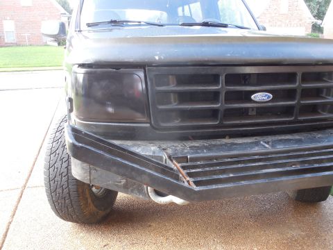 1983 Ford Bronco - It just looks like a blacked-out headlight. You can't even tell that it's an aftermarket projector. When the headlights are on, they create…