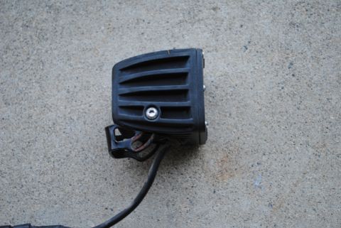1986 Ford Bronco - A close-up view of an aftermarket LED light bar, likely for off-road use, against a textured background.