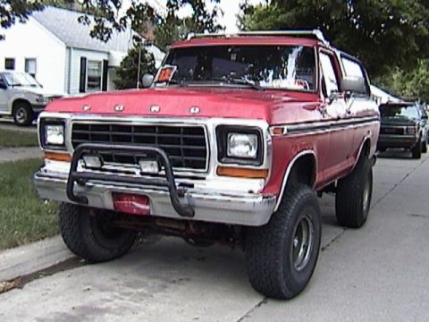1995 Ford Bronco - This red Ford Bronco appears to be from the late 1970s, not a 1995 model.