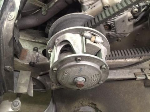 2000 Ford E350 - Close-up view of a snowmobile's clutch and drive belt system.