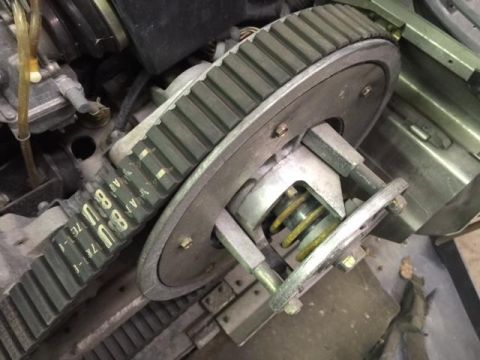 2000 Ford E350 - Close-up of a snowmobile's drive clutch and belt assembly, showing mechanical components.
