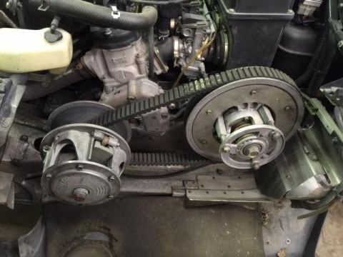 2000 Ford E350 - The drive belt and clutch assembly of a snowmobile engine are shown in detail.
