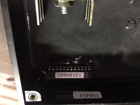 2000 Ford E350 - A close-up view of electronic components with part numbers visible on labels.