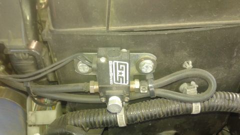 2008 Mazda 3 - Close-up of a G *S Speed bypass valve, likely an aftermarket engine component.