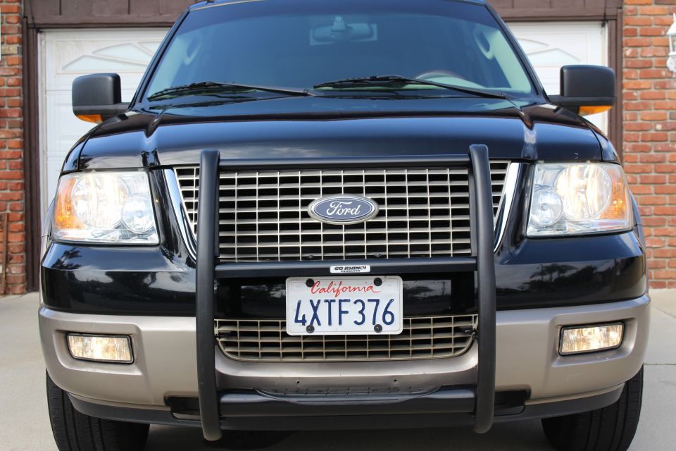 Black Ford Expedition front view with bull bar and California license plate 4XTF376
