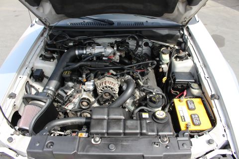 2002 Ford Mustang - Close-up view of the engine compartment, showing the V8 engine and its components.