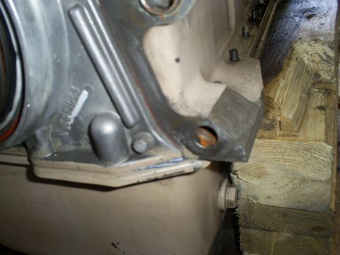 1992 Ford Bronco - Engine block casting detail with part numbers visible, supported by wood.