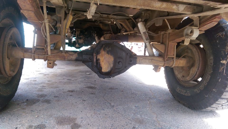 Truck rear axle and suspension components, rusty and dirty