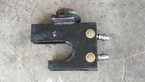 Black metal bracket with two brass bolts and silver fittings, marked with 'PS'