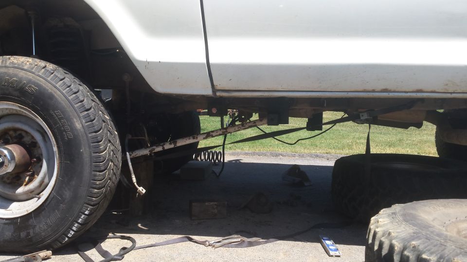 1979 Ford Bronco side view showing undercarriage and suspension components