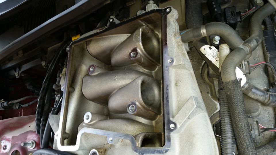 Engine intake manifold with four runners