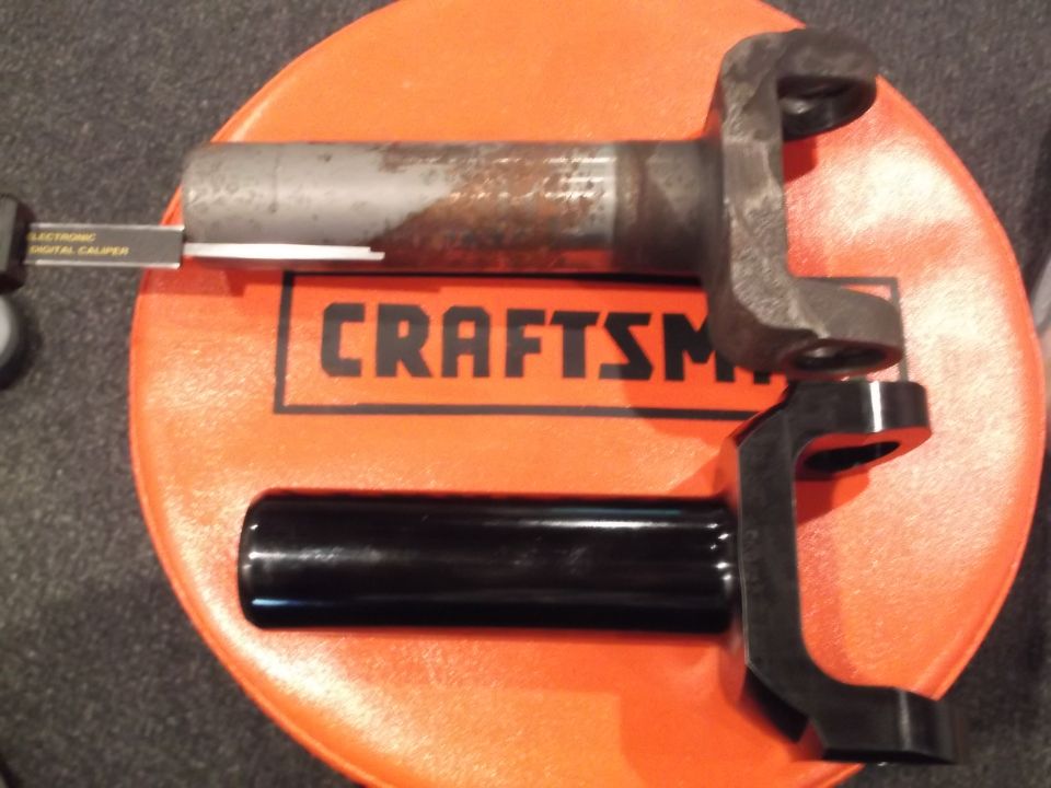 Driveshaft yoke and steering column shaft on a Craftsman tool tray