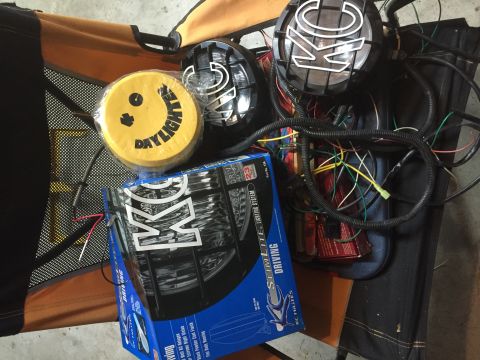 1979 Ford Bronco - Got 3 KC Daylighters and 2 KC driving lights with extra wiring harnesses for $100.