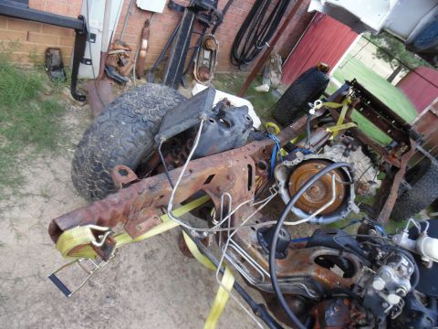 1993 Ford Bronco - The Y-pipe is tweaked from the collision, and the muffler isn't rotated correctly, so they need to come out. Since I didn't allow the insta…