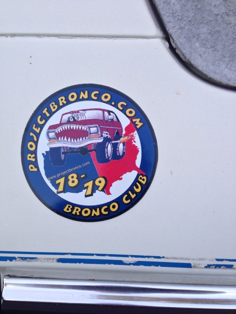 1979 Ford Bronco - Sticker on a vehicle reads 'PROJECTBRONCO.COM 18-19 BRONCO CLUB'.