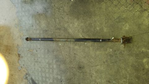tie rod end with a ball joint on a concrete floor