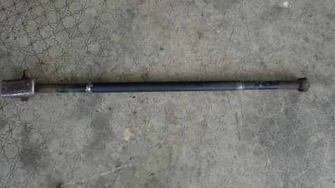 Metal rod with welded ends, one end has a square bracket attached