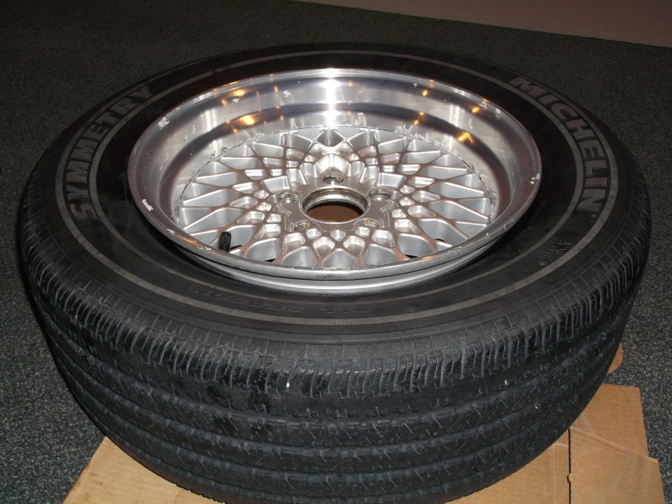 Chrome mesh wheel on a Michelin Symmetry tire