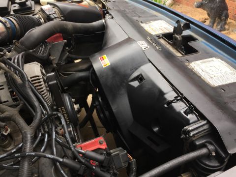 1994 Ford Crown Victoria - Close-up of engine bay components including alternator and fan shroud. Watermark visible.