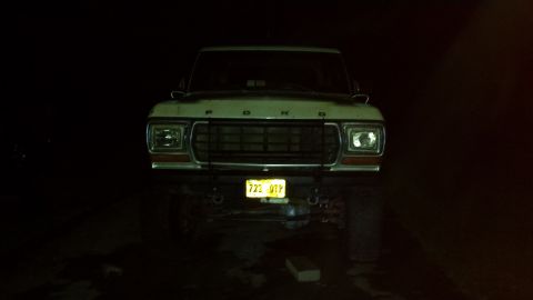 1979 Ford Bronco front view at night with license plate 722 UTP