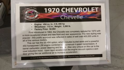 1991 Ford LTD Crown Victoria - Museum display placard describing a 1970 Chevrolet Chevelle SS 454, listing engine, wheelbase, weight, and price.