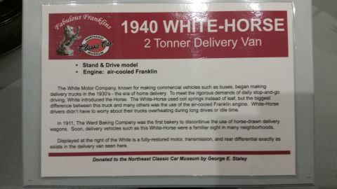 1991 Ford LTD Crown Victoria - Museum display placard describing a 1940 White-Horse 2-Tonner delivery van and its history.