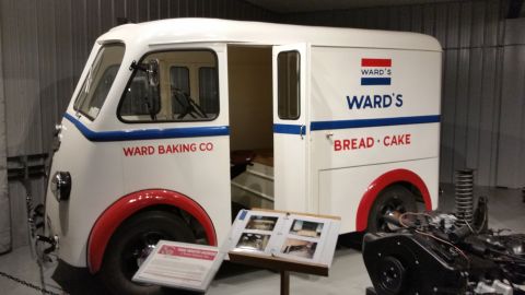 1991 Ford LTD Crown Victoria - Photograph of a vintage Ward Baking Co. delivery van on museum display, not a technical document.