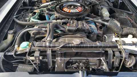 1991 Ford LTD Crown Victoria - Photograph of a Mopar 440 Four Barrel engine bay, not a technical document.