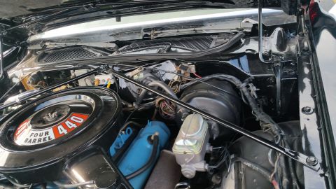 1991 Ford LTD Crown Victoria - Photograph of an engine bay featuring a 440 Four Barrel air cleaner and master cylinder, not a technical document.