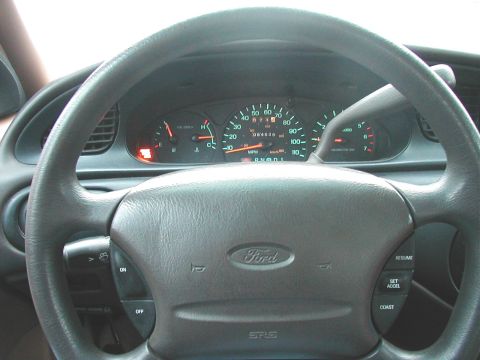 1997 Ford Taurus - Interior view of a 1997 Ford Taurus dashboard, displaying mileage and other gauges.