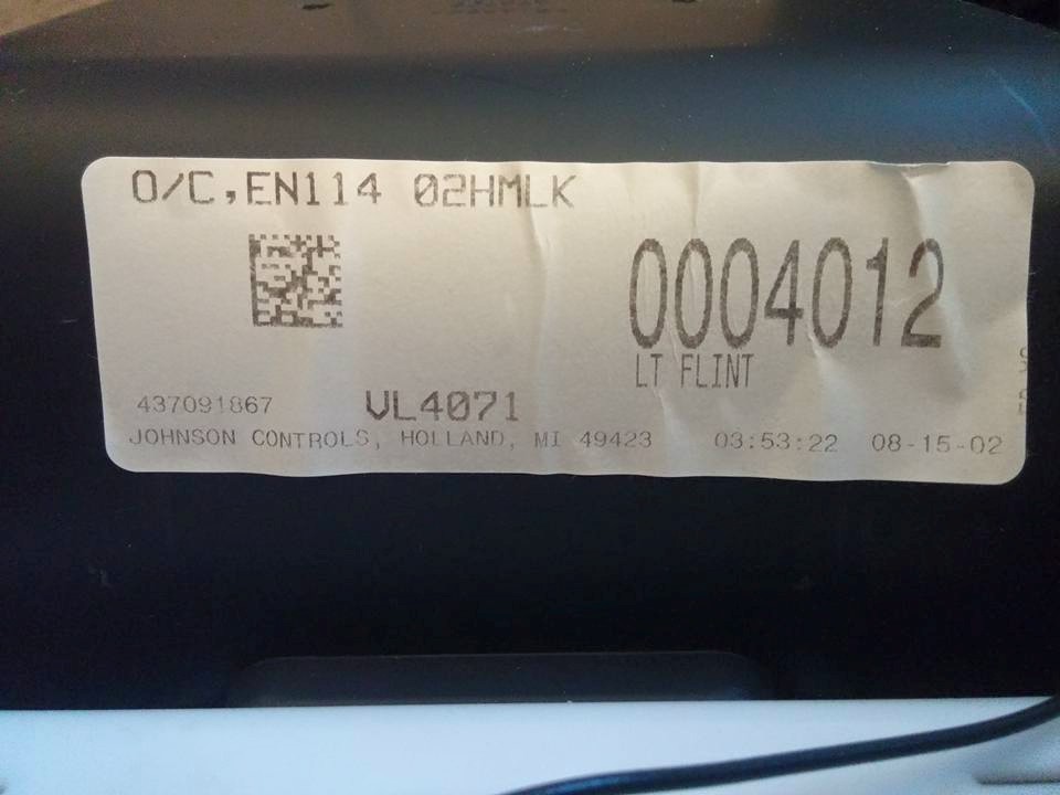 Johnson Controls part label with code O/C EN114, number 0004012 and date