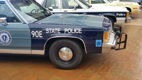 1991 Ford LTD Crown Victoria - A 1991 Ford Crown Victoria police car is parked next to another police vehicle.
