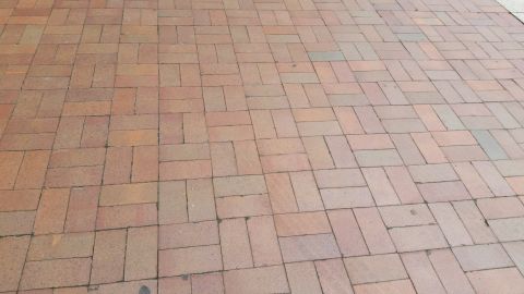 1991 Ford LTD Crown Victoria - Photograph of brick paving stones in a herringbone pattern, not a technical document.