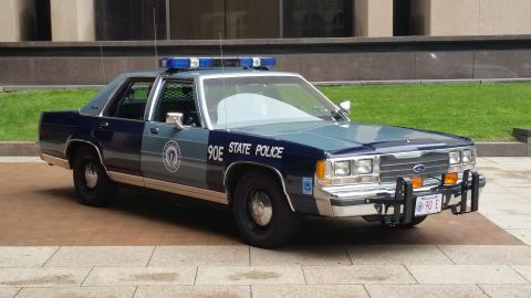 1991 Ford LTD Crown Victoria - Photograph of a Massachusetts State Police Ford LTD Crown Victoria cruiser, not a technical document.