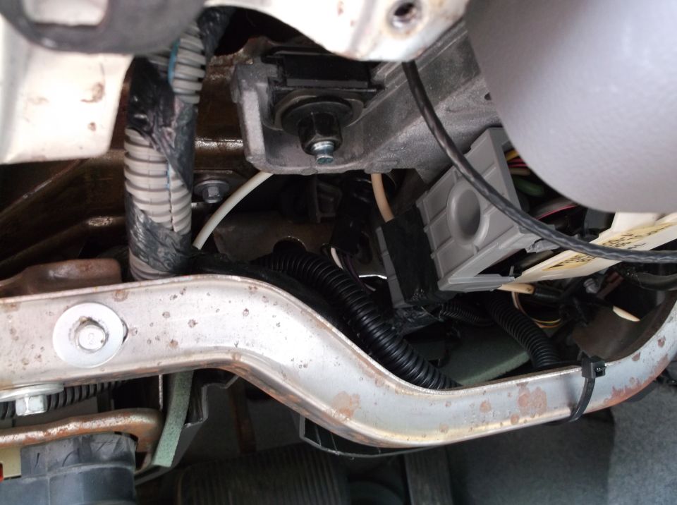 Under-dash wiring and components in a vehicle.