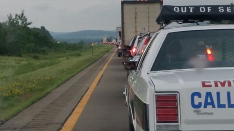 1991 Ford LTD Crown Victoria - Photograph from an emergency vehicle showing stopped highway traffic behind an out-of-service truck.