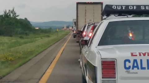 1991 Ford LTD Crown Victoria - Photograph of stopped highway traffic viewed from beside an emergency vehicle.