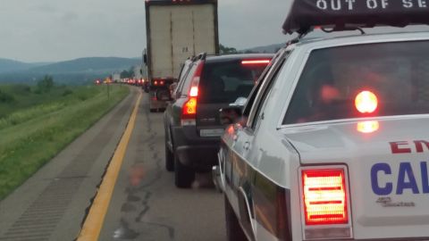 1991 Ford LTD Crown Victoria - Photograph of congested highway traffic at dusk taken from beside an emergency vehicle.